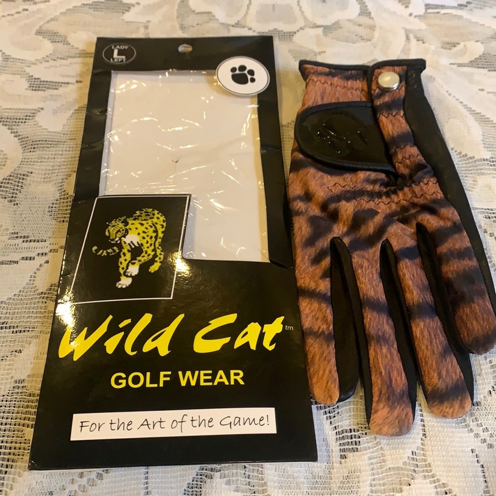 Lady Large left wild cat golf wear.